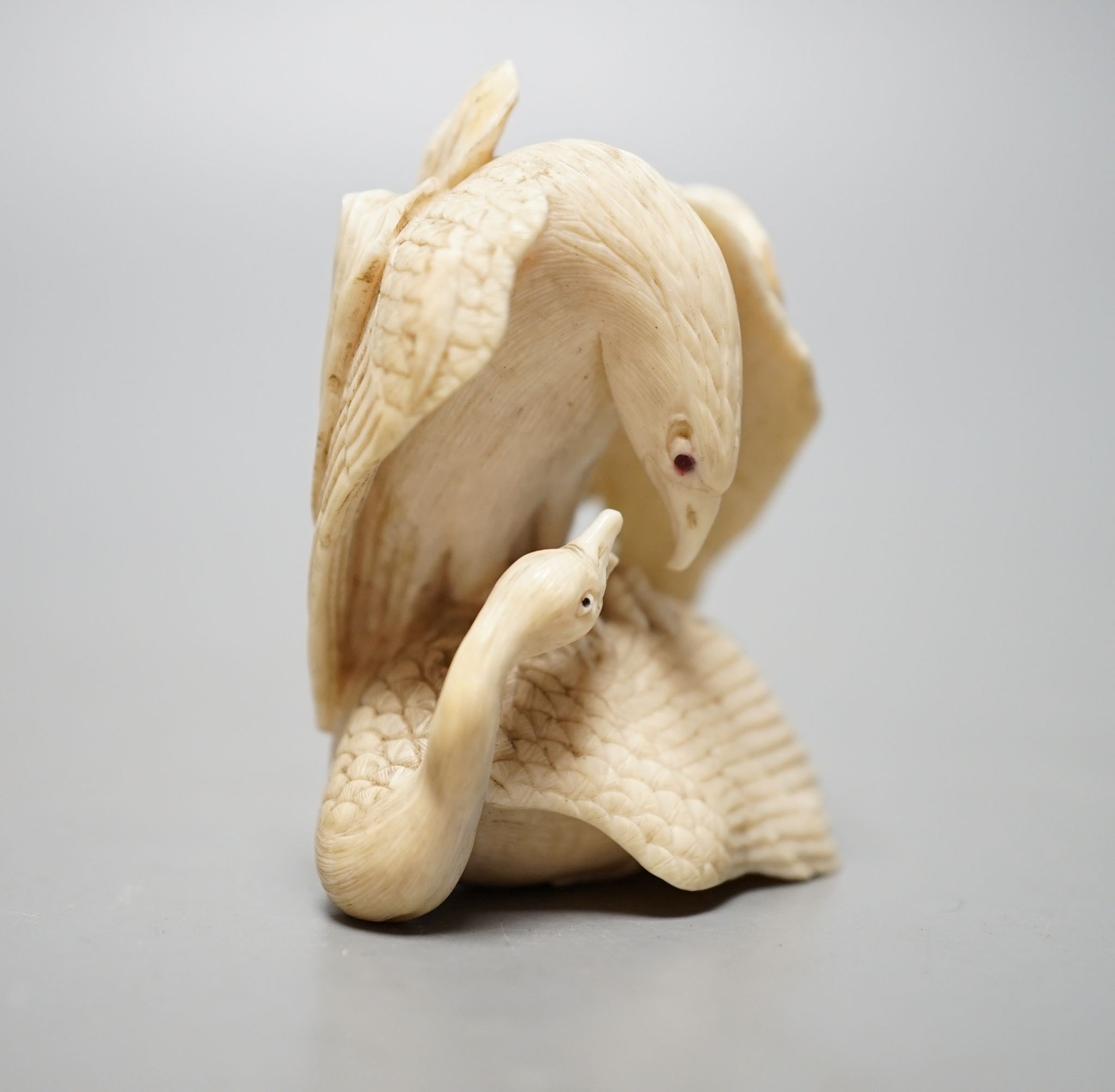 A Japanese ivory eagle and goose okimono, 5.5cm